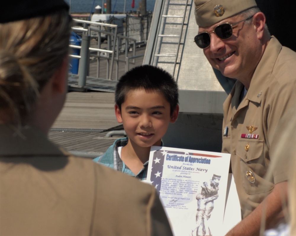 USS Wisconsin (BB-64) hosts a re-enlistment ceremony