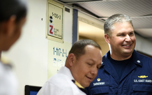 Coast Guard Cutter Tahoma's commanding officer is presented a gift by Colombian naval officials in spirit of UNITAS exercise