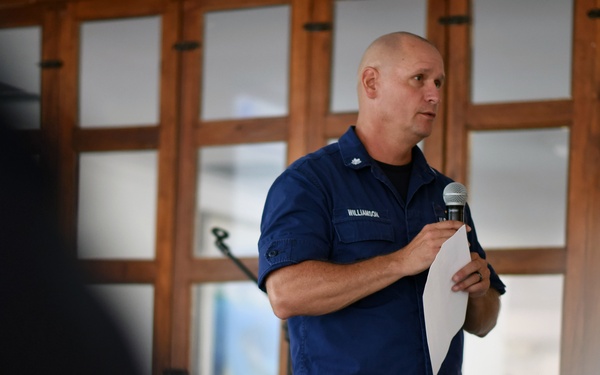 A Coast Guard commander gives a maritime interdiction and operations presentation during UNITAS 2018