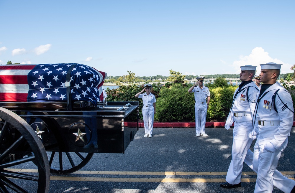 Midshipmen salute the late Sen. John McCain