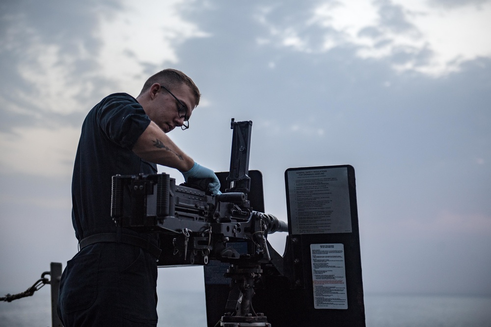 Sailor maintains .50-caliber machine gun aboard USS Jason Dunham (DDG 109)