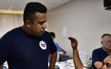 Navy Reserve Hospital Corpsman translates for Puerto Rican Innovative Readiness Training