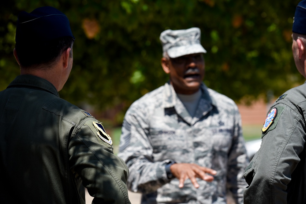 Most senior command chief, Johnson, speaks at SNCO induction