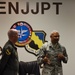 Most senior command chief, Johnson, speaks at SNCO induction