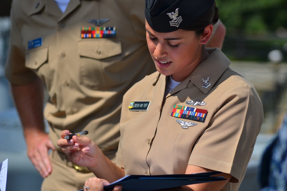 Naval Museum hosts a re-enlistment ceremony aboard the USS Wisconsin (BB-64)