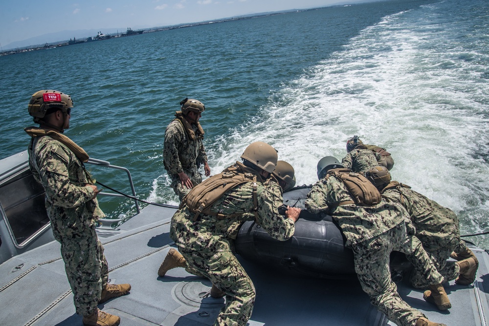 Coastal Riverine Forces Conducts CRRC Training Aboard Mark VI Ptrol Boat During CPO Initiation