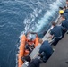 USS Jason Dunham Sailors exchange gifts with French auxillary ship Dupuy De Lome sailors after coducting escort