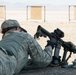 Air National Guardsman from Nevada inserts the magazine for her weapon during weapons qualifications training