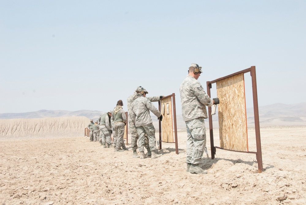 Air National Guardsmen conduct weapons training in preparation for deployment