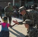 Haircuts and high fives: 20th CBRNE Soldiers welcome area elementary school students back to class
