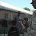 Haircuts and high fives: 20th CBRNE Soldiers welcome area elementary school students back to class