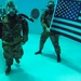 SMDC Soldier, Wounded Warrior reenlists 30 feet underwater