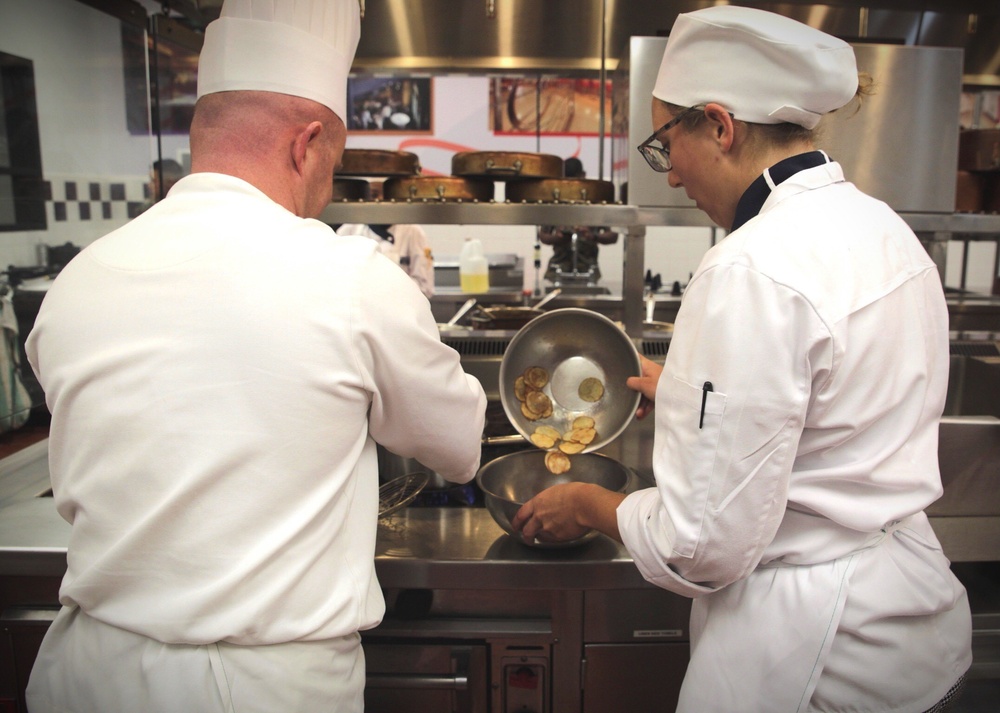 Marines serve during cooking competition at Marine Week Charlotte