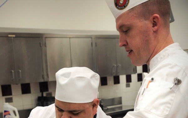 Marines serve during cooking competition at Marine Week Charlotte
