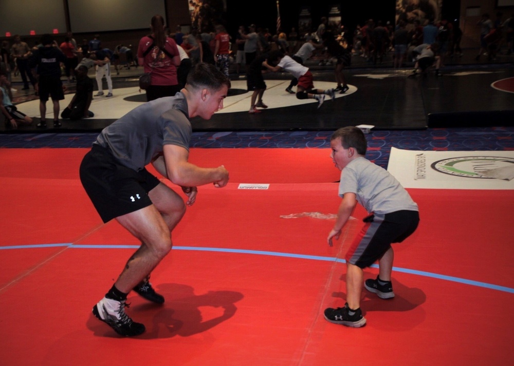Marines, Wrestlers partner for youth clinic during Marine Week Charlotte