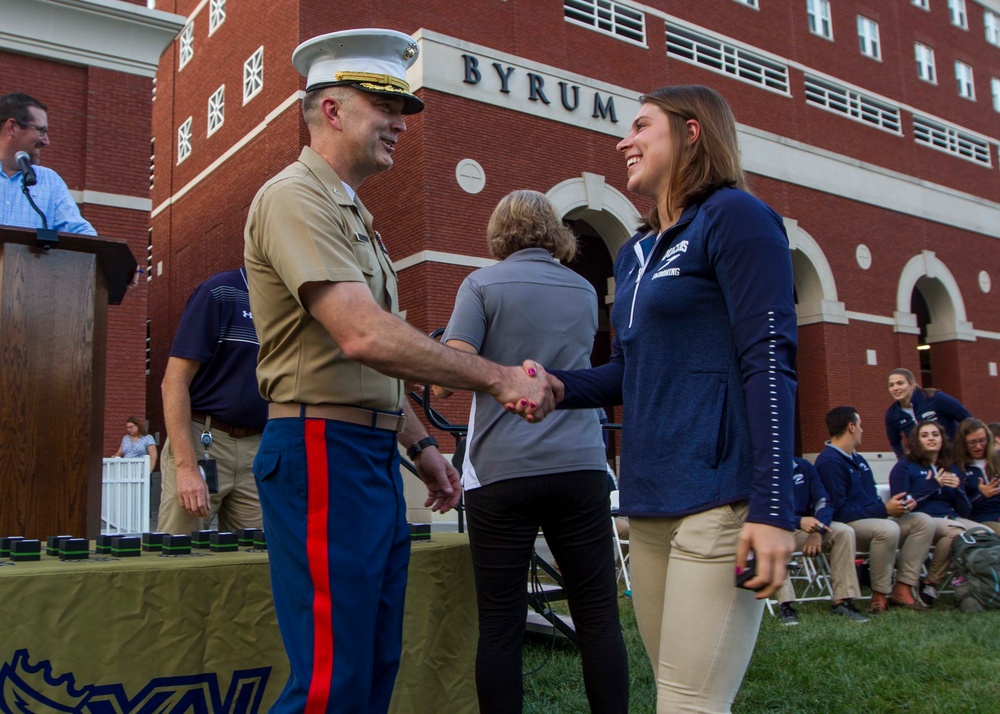 Marines Congratulate Queen's University Swim Team