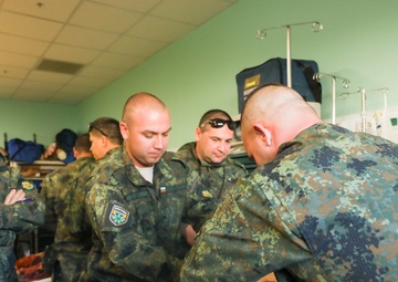 Medics teach NATO forces combat casualty care
