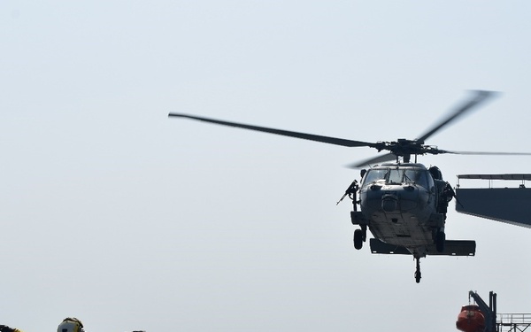 HSC 26 H-60 Helicopter prepares for landing