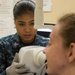 Sailor Performs Physical Health Assessment