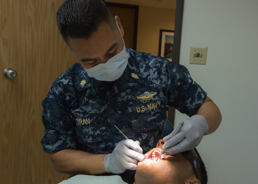Sailor Performs Physical Health Assessment
