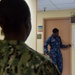 Sailor Performs Physical Health Assessment