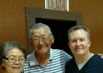 Air Guard dentist meets relatives during training mission