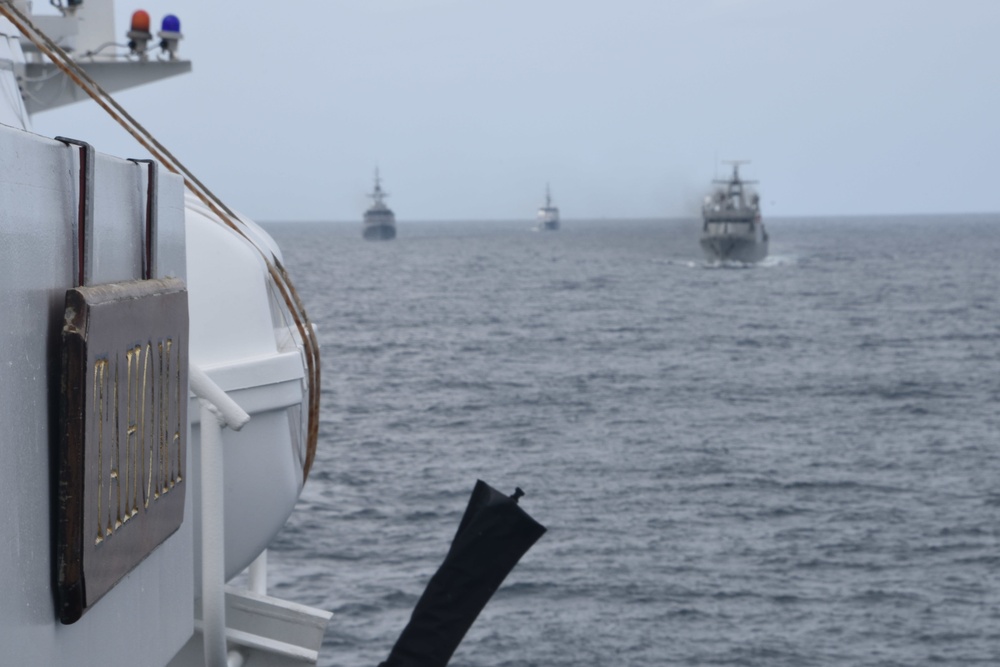 The Coast Guard Cutter Tahoma sails off the coast of Colombia as Latin American Naval ships trail behind