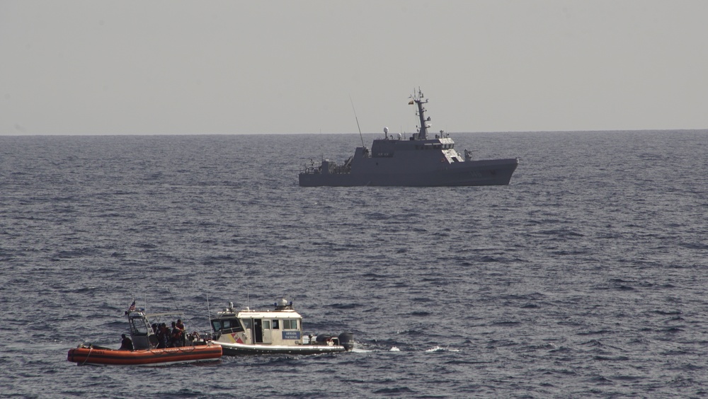 A Coast Guard Cutter Tahoma small boat preforms a boarding exercise during UNITAS 2018