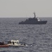 A Coast Guard Cutter Tahoma small boat preforms a boarding exercise during UNITAS 2018