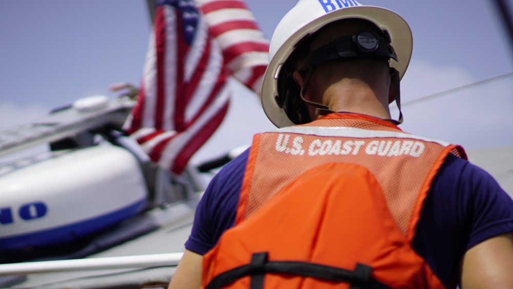 Chief Petty Officer Bradford Kline observes boat lowering detail on the Coast Guard Cutter Tahoma during UNITAS 2018