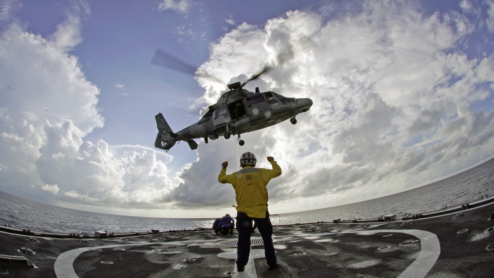 Petty Officer 1st Class Darla George conducts flight operations on the Coast Guard Cutter Tahoma during UNITAS 2018