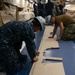Nimitz Sailors Replace Flooring