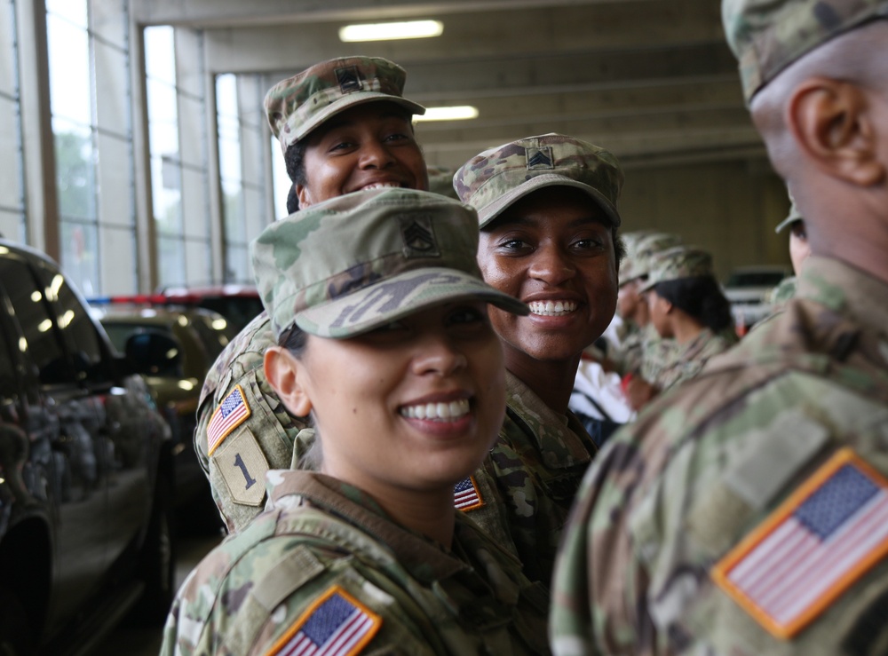 Maryland National Guard Soldiers and Airmen display flag at Baltimore Ravens Game