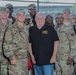 Maryland National Guard Soldiers and Airmen display flag at Baltimore Ravens Game