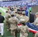 Maryland National Guard Soldiers and Airmen display flag at Baltimore Ravens Game