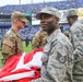 Maryland National Guard Soldiers and Airmen display flag at Baltimore Ravens Game