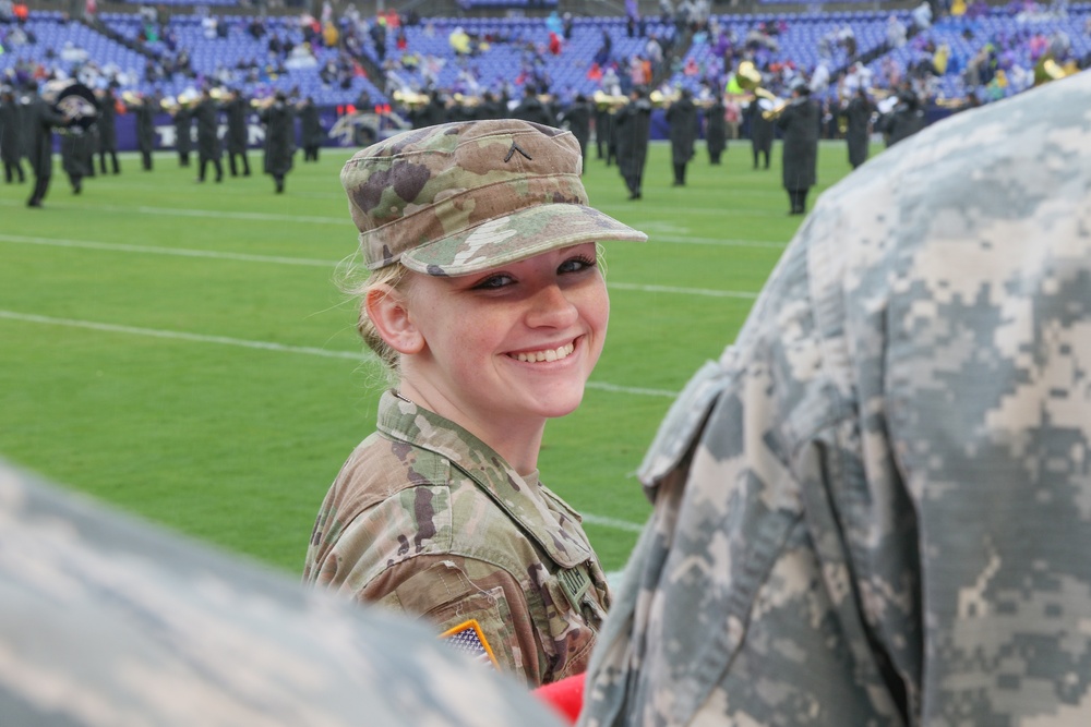 Maryland National Guard Soldiers and Airmen display flag at Baltimore Ravens Game