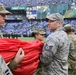 Maryland National Guard Soldiers and Airmen display flag at Baltimore Ravens Game