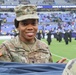 Maryland National Guard Soldiers and Airmen display flag at Baltimore Ravens Game