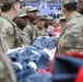 Maryland National Guard Soldiers and Airmen display flag at Baltimore Ravens Game