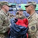 Maryland National Guard Soldiers and Airmen display flag at Baltimore Ravens Game