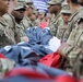 Maryland National Guard Soldiers and Airmen display flag at Baltimore Ravens Game