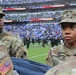 Maryland National Guard Soldiers and Airmen display flag at Baltimore Ravens Game