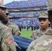 Maryland National Guard Soldiers and Airmen display flag at Baltimore Ravens Game