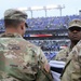 Maryland National Guard Soldiers and Airmen display flag at Baltimore Ravens Game