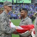 Maryland National Guard Soldiers and Airmen display flag at Baltimore Ravens Game