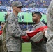 Maryland National Guard Soldiers and Airmen display flag at Baltimore Ravens Game