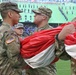 Maryland National Guard Soldiers and Airmen display flag at Baltimore Ravens Game