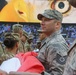 Maryland National Guard Soldiers and Airmen display flag at Baltimore Ravens Game