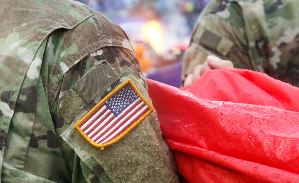 Maryland National Guard Soldiers and Airmen display flag at Baltimore Ravens Game